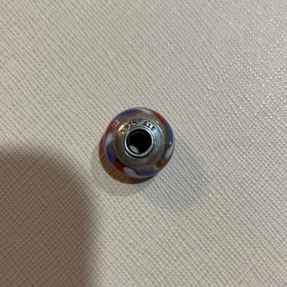 Pandora red, white and blue Murano glass bead.